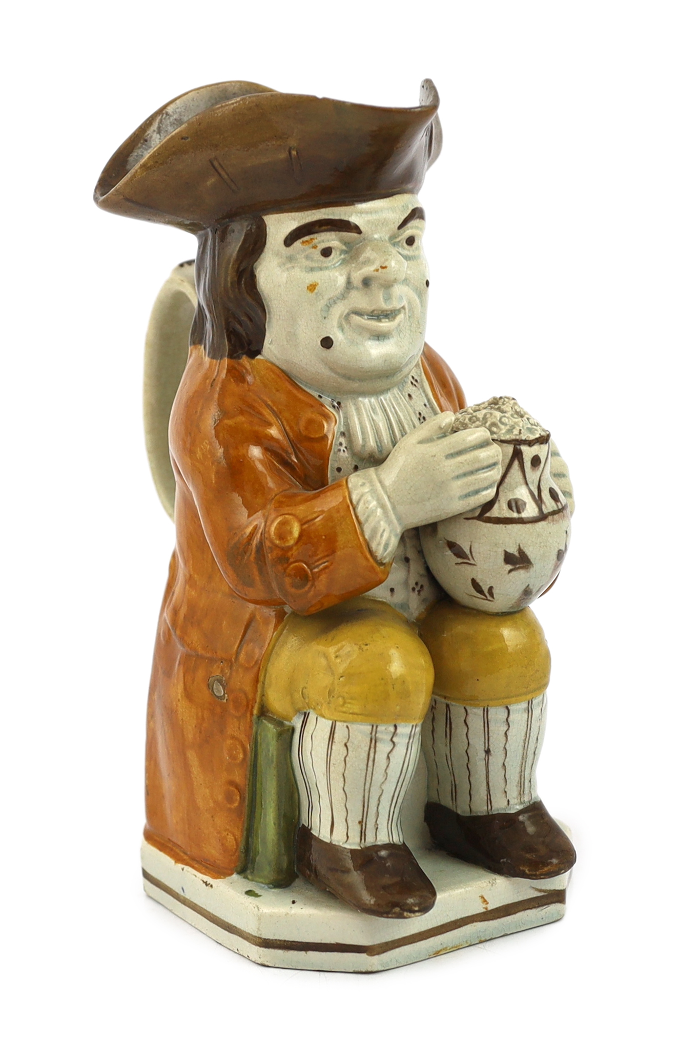 A Staffordshire Prattware Toby jug, c.1790-1800, restoration to front of hat